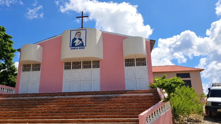 AI-enhanced from APREM historical slideshow frame of the Morisseau parish church.